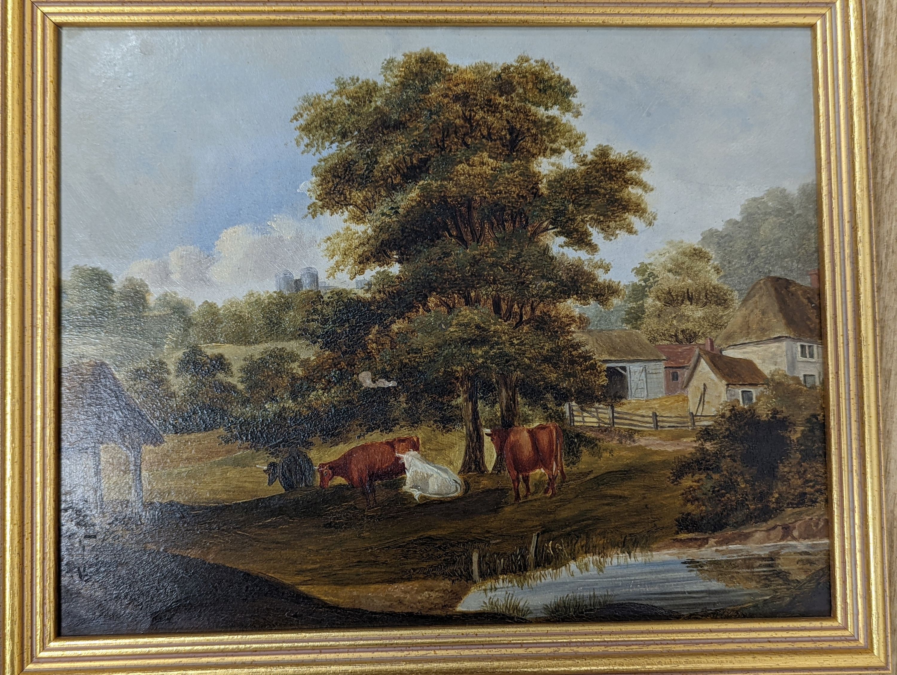 Two 19th century oils on board, landscapes, signed indistinctly, and the other depicting cattle in yard, 25 x 19cm, 23 x 29.5cm